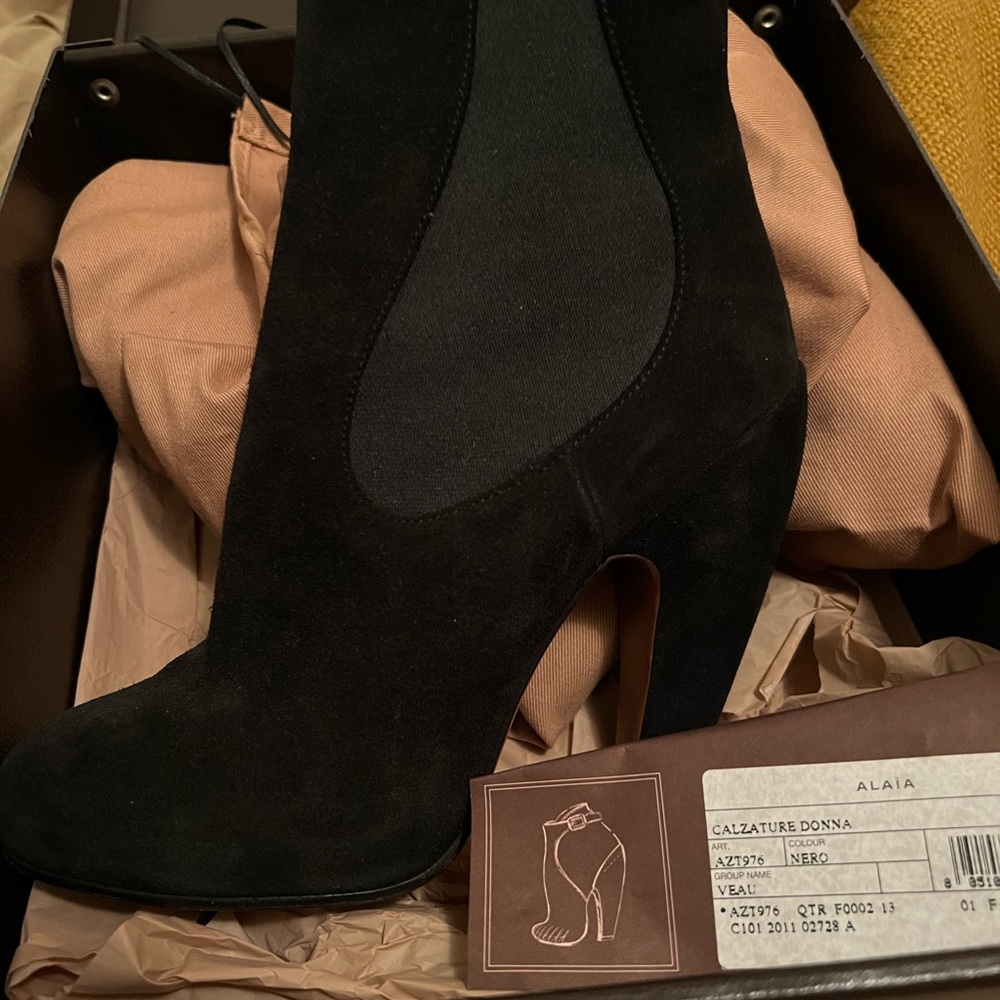 Alaia black suede booties never been warned
